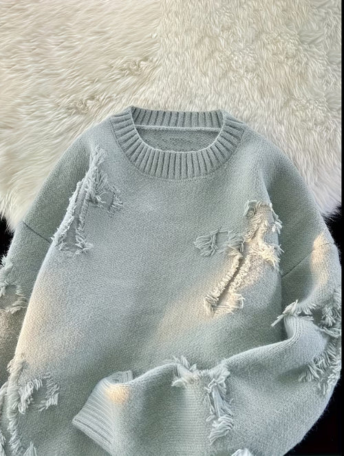 Pull en maille effet déchiré tendance